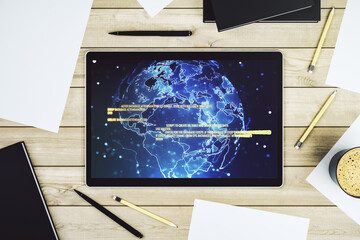 Modern digital tablet screen with abstract graphic coding sketch and world map, big data and networking concept. Top view. 3D Rendering