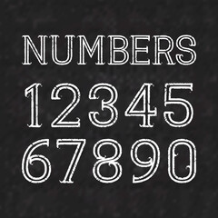 White numbers of shabby paint on a black marble surface. Outline font with cracks in grunge style.