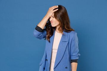 Displeased dissatisfied frustrated young brunette woman 20s wearing basic casual jacket standing...