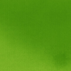 A green vintage rough sheet of carton. Recycled environmentally friendly cardboard paper texture. Simple and bright minimalist papercraft background.