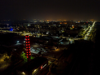 Fototapeta na wymiar Aerial photo of city lights at night small town