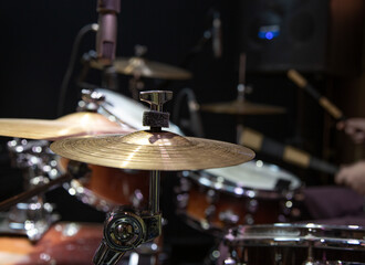 Cropped image of drum set. Drum kit with crash, ride, splash cymbal.