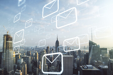 Abstract virtual postal envelopes illustration on New York city skyline background. Email and communications concept. Multiexposure