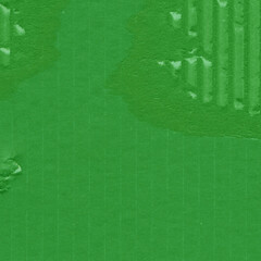 A green vintage rough sheet of carton. Recycled environmentally friendly cardboard paper texture. Simple and bright minimalist papercraft background.