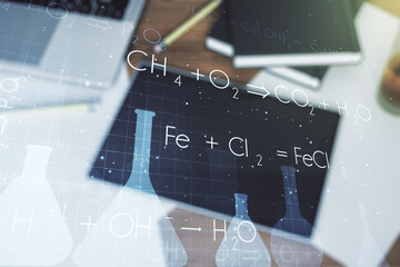 Creative chemistry concept and modern digital tablet on background, top view. Multiexposure