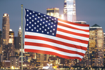 USA flag on blurry cityscape background at evening