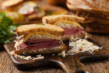Ruben sandwich. New York sandwich with pastrami, sauce 1000 islands and sauerkraut.