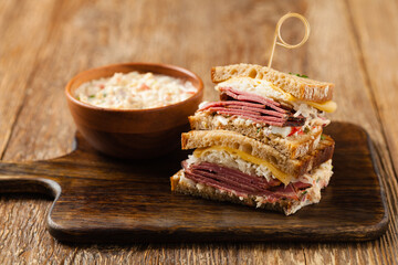 Ruben sandwich. New York sandwich with pastrami, sauce 1000 islands and sauerkraut.