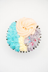 Cupcake with icing on white background