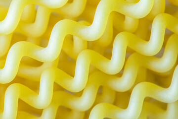 Close up macro of uncooked spiral fusili Italian pasta