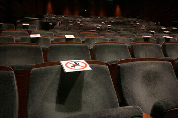 Covid-19 approved and non approved seats in the theatre
