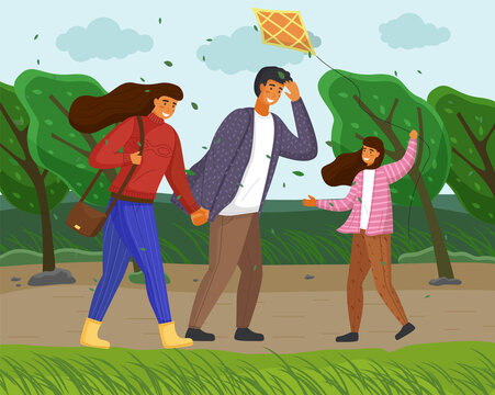 Family walks in autumn park or forest. Mom in red sweater, girl play a kite, father protected from strong winds. Fall landscape, scenic area. Yellow landscape, picturesque area. Spend time with family
