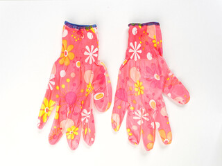 gloves in an assortment of construction gloves for a garden and a vegetable garden on a white background