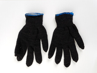 gloves in an assortment of construction gloves for a garden and a vegetable garden on a white background