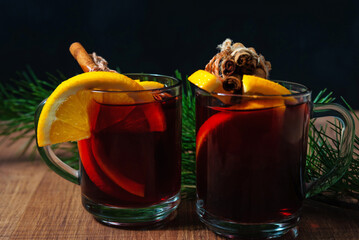 Mulled wine with on a wooden background