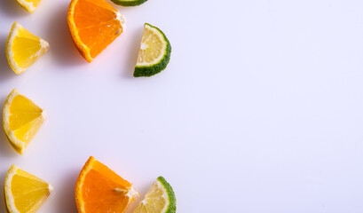 Fototapeta na wymiar Lemon,orange,lime slices on a white background,isolated,creative layout,