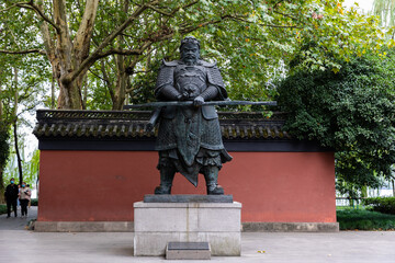 Statue of King Qian Liu outside the reconstructed King Qian Temple by West Lake or Xihu, Hangzhou,...
