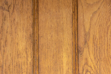 Obraz premium Texture of lacquered wood planks painted in brown.