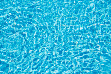 surface of blue swimming pool,background of water in swimming pool.