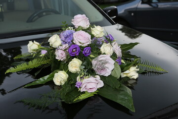 wedding bouquet on the car