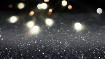 Dark blurred abstract background, bokeh. A flash of blurry lights. Reflection of city lights on the...