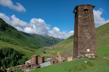 Panoramic view on traditional ancient Svan towers and houses in Ushguli, a village recognized as the UNESCO World Heritage Site and one of the highest inhabited settlements in Europe, Svaneti, Georgia