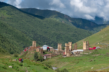 Fototapeta na wymiar Panoramic view on traditional ancient Svan towers and houses in Ushguli, a village recognized as the UNESCO World Heritage Site and one of the highest inhabited settlements in Europe, Svaneti, Georgia