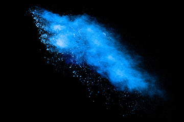 Fototapeta na wymiar Blue powder explosion cloud on black background.Launched blue dust particles splash.