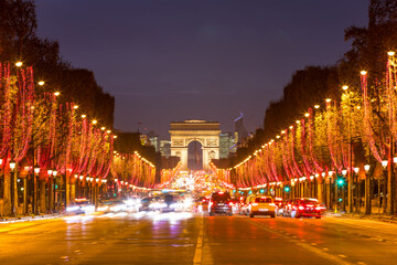 Arc de Triomphe and Champs Elysees in Paris at night