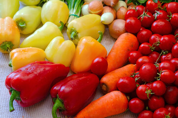 Assortment of fresh vegetables. Tomatoes, onions, peppers, parsley, dill, carrots