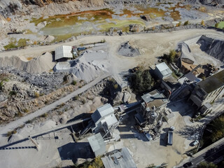 Aerial drone view quarry and polluted pond 