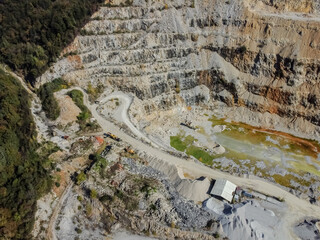 Aerial drone view quarry and polluted pond 