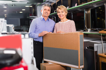 Glad mature couple are happy with choice and purchased consumer electronics for your home