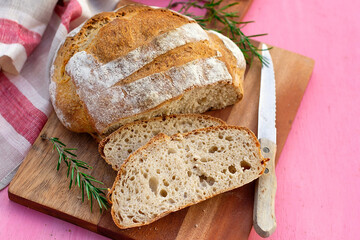 Homemade sourdough bread served on a cutting board