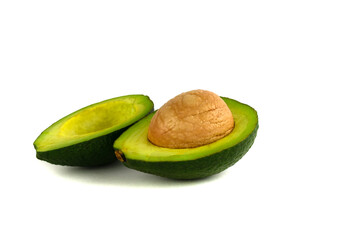 Two halves of avocado with and without a stone