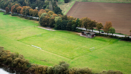 Bird's eye view of a football field in the countryside