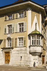 Oriel windows on the facade of a baroque house in Solothurn Switzerland
