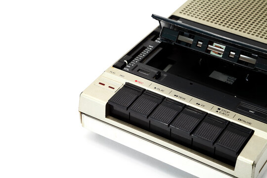 Old vintage portable cassette player from the 1980s isolated on a white background
