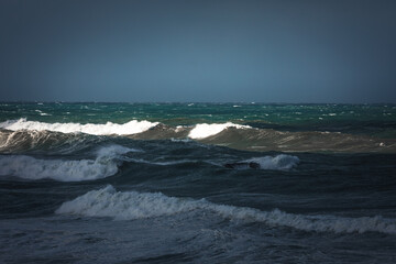 Sea storm with really big waves hitting the coast of Biarritz, at the Basque Country.