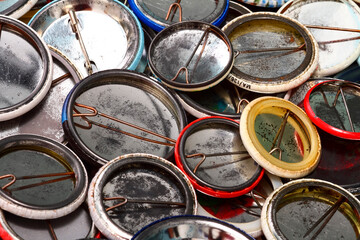 Collection of old vintage advertising pin badges