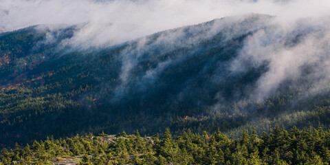 A foggy autumn morning on top of Mount Monadnock in Jaffrey New Hampshire