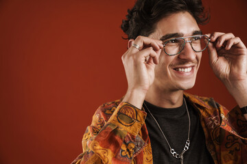 Portrait of a smiling casual hipster man standing