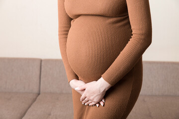 urinary incontinence during pregnancy. Abdominal pain during pregnancy. Maternity healthcare concept