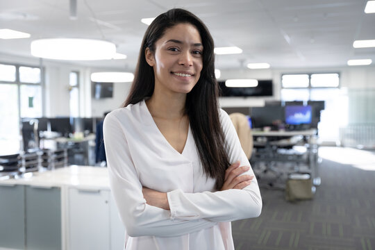 Portrait of businesswoman smiling at modern office