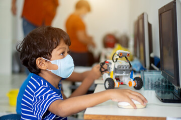 Boy wear face masks to prevent the Coronavirus 2019 (COVID-19) in schools.