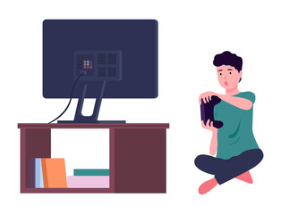 Worried boy with joystick in hands playing video game at tv screen, relaxing playing games at home sitting at floor. Indoors activity, hobby, recreation. Leisure time at home, isolated character