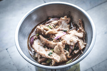 Namtok Pork Salad. local Thai food.