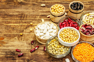 Set of various dry legumes in bowls as indispensable protein for a healthy life