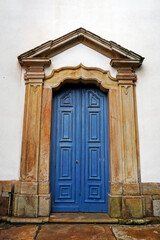 Ancient colonial door in historical city of Ouro Preto, Brazil 