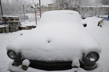 snow covered car
